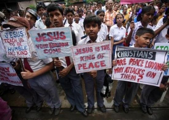 School children listen to a speech by a Christian leader during a protest rally in the eastern Indian city of Kolkata August 29, 2008 after Hindu mobs ransacked a church and clashed with Christian villagers in the eastern state of Orissa. (Reuters/Jayanta Shaw)