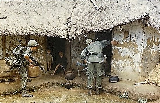U.S. soldiers searching a village for Viet Cong. Photo: https://en.wikipedia.org/