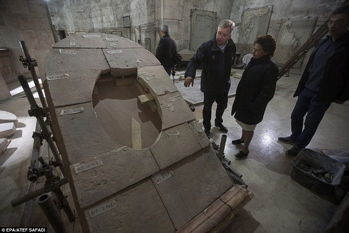 Antonia Moropoulou, professor at Athen's National Technical University of Athens and the Chief Scientific Coordinator of the restoration project (shown right) stands next to ancient stone