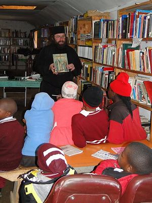 Fr. Silouan teaching a lesson at St. Barnabas' Orphanage and Education Center