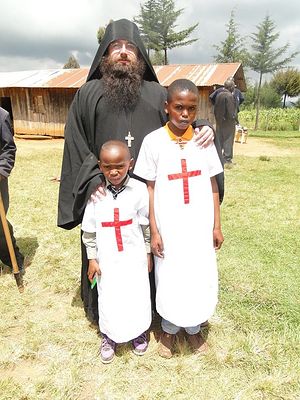 Отец Силуан со своими двумя новыми крестниками