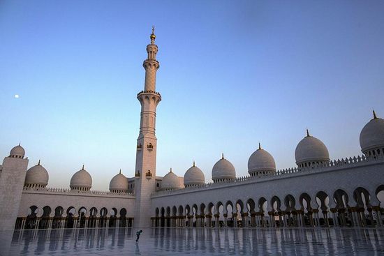 A boy jumps in the courtyard at the Sheikh Zayed Grand Mosque on February 1, 2015 in Abu Dhabi, United Arab Emirates. Authorities have renamed the Sheikh Mohammad Bin Zayed Mosque in Al Mushrif, a district in the capital Abu Dhabi, to ‘Mariam, Umm Eisa’—Arabic for ‘Mary, the mother of Jesus’. DAN KITWOOD/GETTY