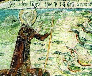 St. Julius banishes snakes from the island. Painting from the Church of St. Julius on the island of San Giulio. XV c.