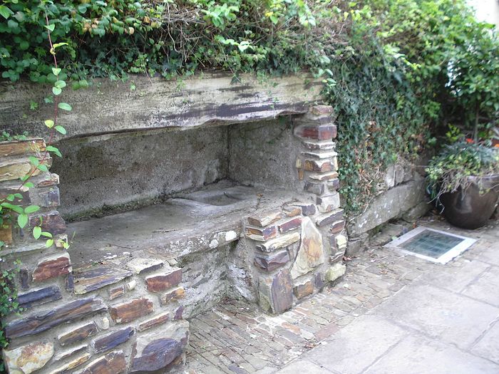 The Slab and the holy well in Chittlehampton, Devon (photo provided by the vicar of Chittlehampton)