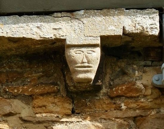 Face on tower, the Church of Sts. Peter and Paul in Kings Sutton, Northants (photo used with the kind permission of the vicar of Kings Sutton)