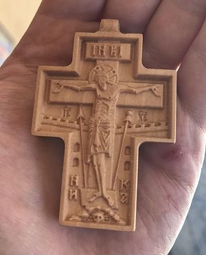 Hand-carved neck cross. Photo: draganacmonastery.com